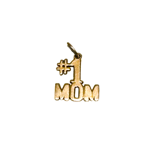 A 14k gold charm in the shape of the phrase '#1 Mom'