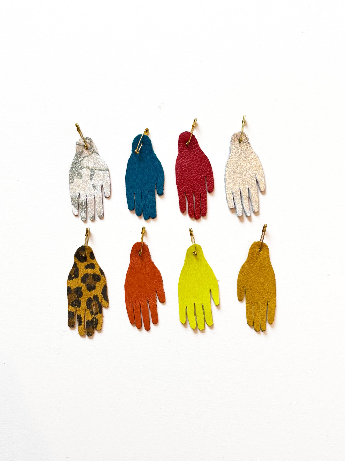 Handmade leather hand pins